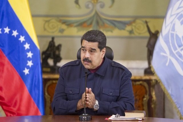 Venezuela lets Maduro recall advance, with threats