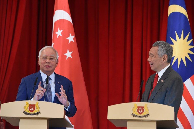 Malaysia’s Najib takes pop at Mahathir on Singapore trip
