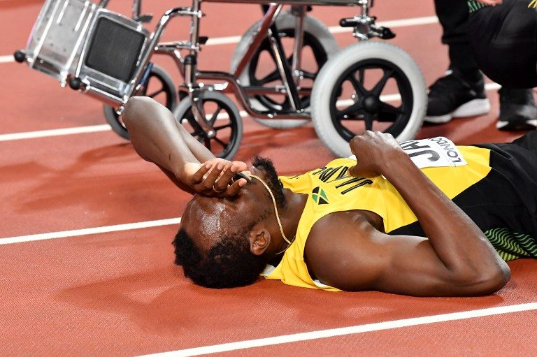 Sad farewell for injured Bolt as Britain wins 4x100m relay