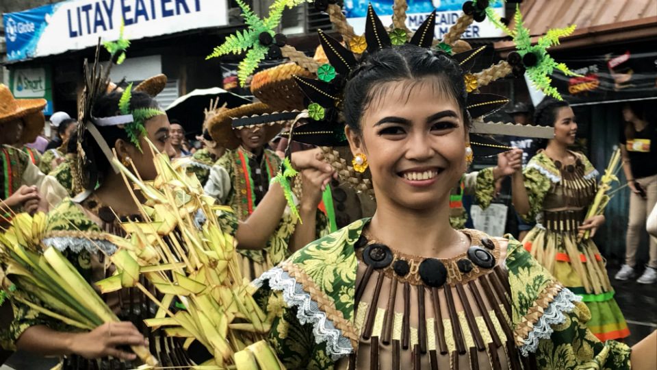 ALL SMILES. Sariaya, Quezon dancers are all smiles even if it's raining that Sunday afternoon, August 19, 2018.    