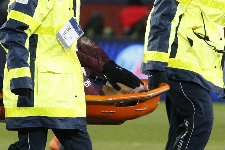STRETCHERED. Paris Saint-Germain's Brazilian forward Neymar Jr is evacuated on a stretcher during the French L1 football match between Paris Saint-Germain (PSG) and Marseille (OM) at the Parc des Princes in Paris on February 25, 2018. Photo by Geoffroy van der Hasselt/AFP 