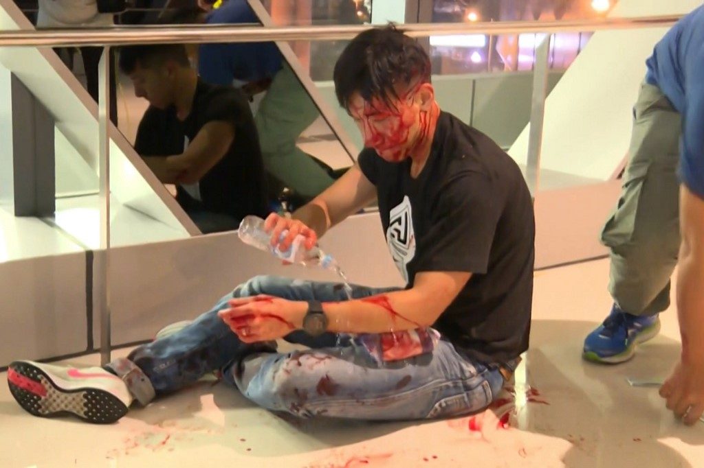 ‘Triad’ attack on Hong Kong protesters sparks anger