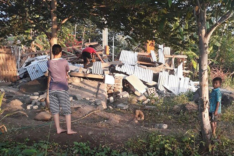Strong quake kills 14, injures scores, on Indonesia holiday island