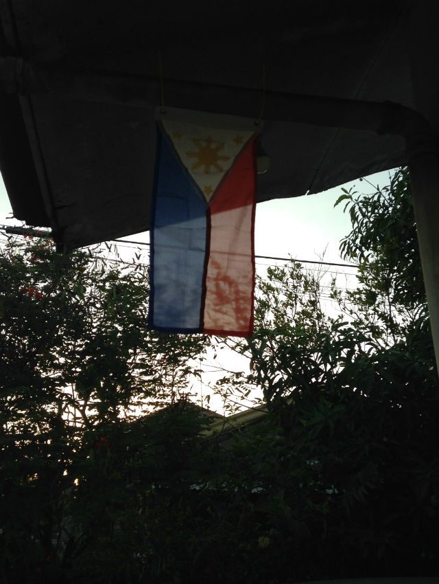 The Philippine flag outside the author's home
