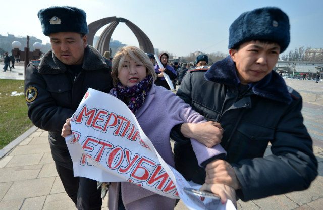 Kyrgyz police detain dozens at Women’s Day march