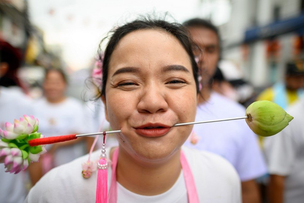 Mouthwatering? Thai island hosts cheek-piercing veg festival