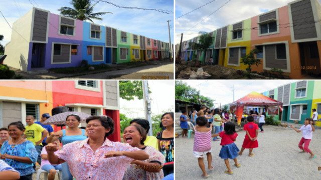 ALL SMILES. Colorful homes welcome their new residents in the Globe Tattoo Village in Tambulilid, Ormoc City.