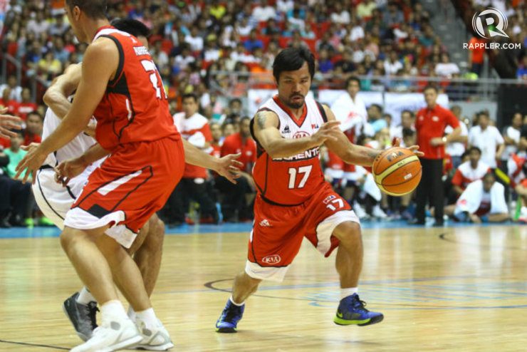 Manny Pacquiao drives to the rim off a screen. Photo by Josh Albelda