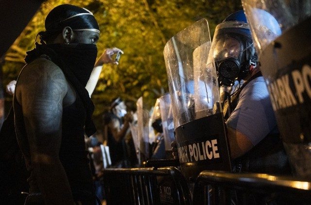 Troops, police clamp down in U.S. cities as unrest over racism flares