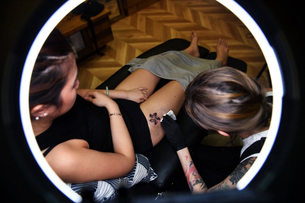 Skin in the game: Hong Kong protesters get inked