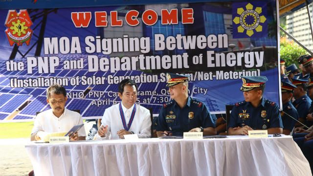 PNP Officer-In-Charge PDDG Leonardo Espina and Department of Energy Secretary Carlos Jericho Petilla sign the Memorandum of Agreement (MOA) for the development and utilization of renewable energy resources through the installation of Solar Generation System during the Monday flag raising ceremony on April 6 in Camp Crame, Quezon City. Photo by PNP PIO 