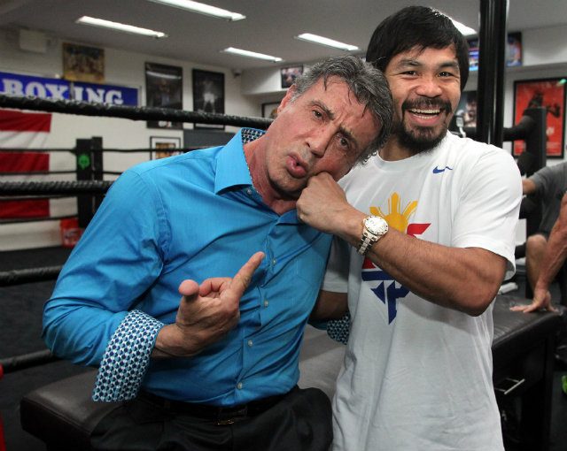 Manny Pacquiao and Sylvester Stallone share a laugh at the Wild Card Gym. Photo by Chris Farina - Top Rank 