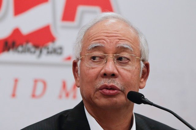 Malaysia’s PM Najib hangs on