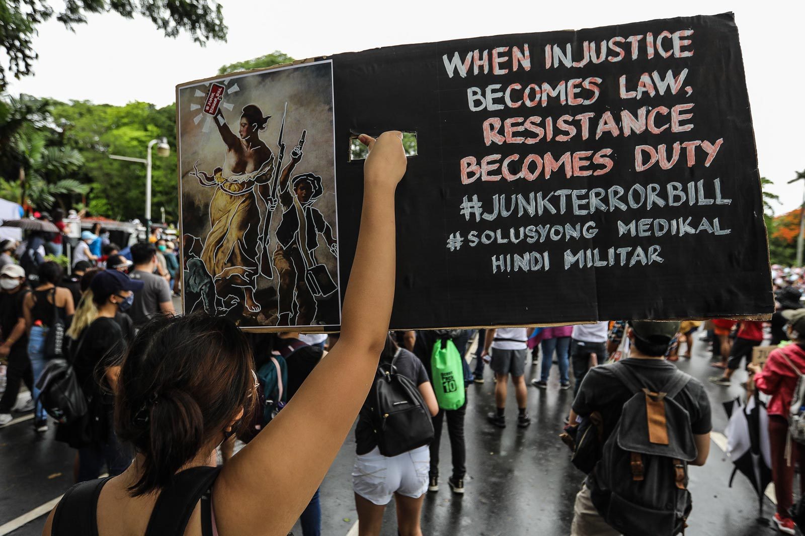 PROTESTS. Thousands brave the rain to protest the anti-terrorism bill at the University of the Philippine campus in Diliman, Quezon on June 12, 2020. Photo by Jire Carreon/Rappler 