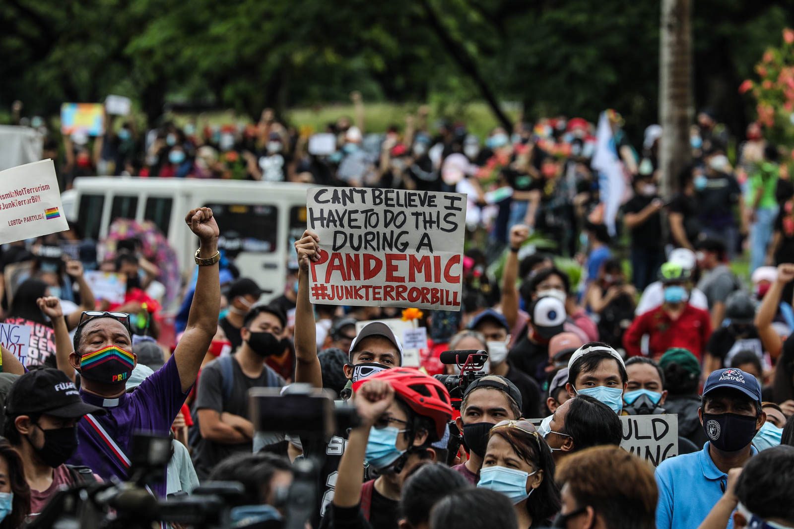 OUTRAGE. Thousands brave the rain to protest the anti terrorism bill during the 'Grand Mañanita' Independence Day rally inside the University of the Philippine campus in Quezon City. Photo by Jire Carreon/Rappler 