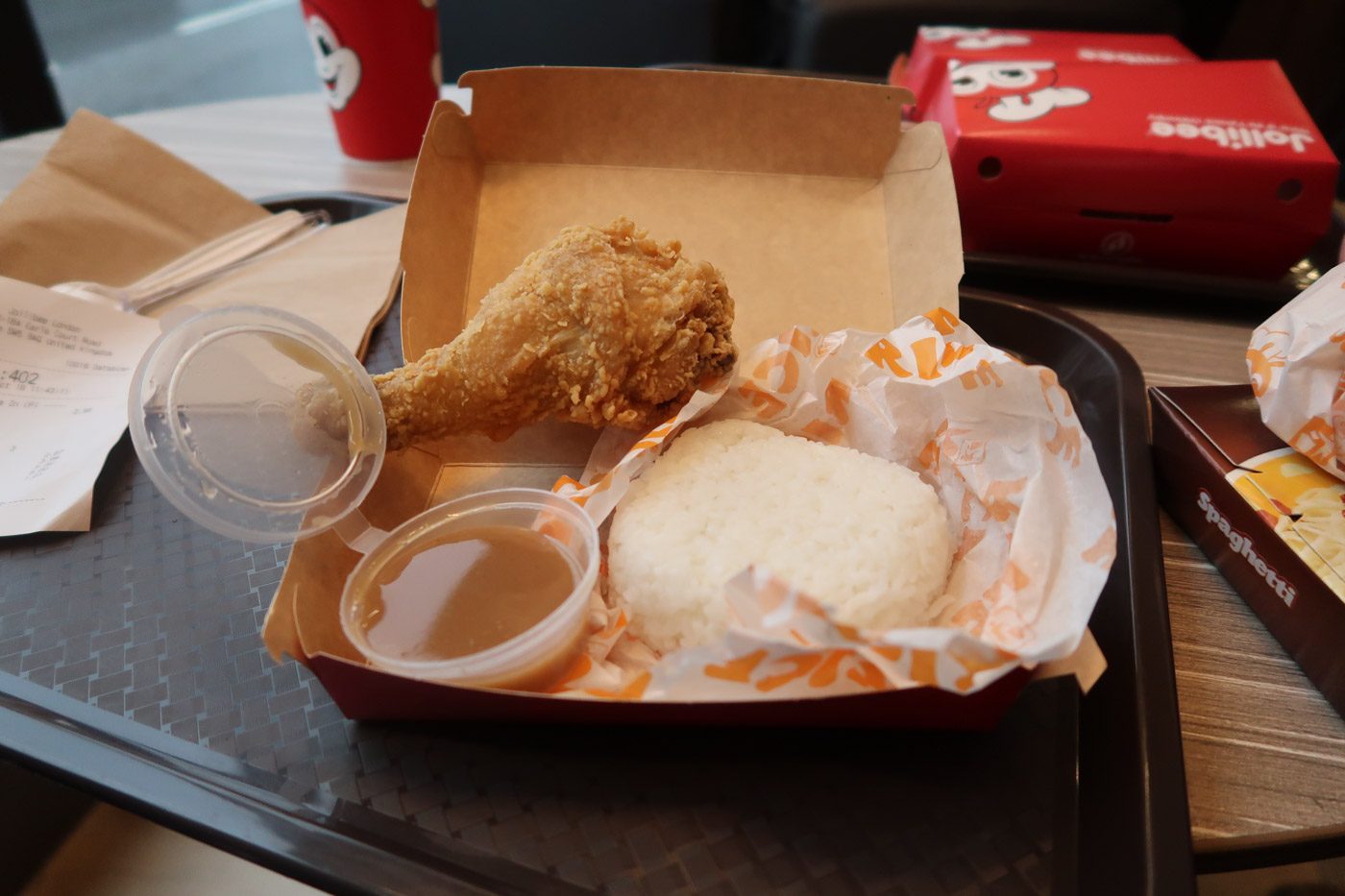EXTRA RICE, PLEASE. Chickenjoy – in all its fried glory – somehow always hits the sweet spot. Photo by Stella Gonzales/Rappler  