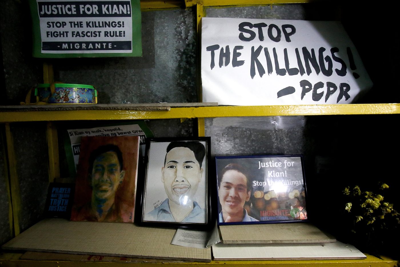 FINAL VIGIL. Protest placards, picture,s and paintings from supporters fill the Delos Santos store shelves in Caloocan City on August, 25, 2017, the eve of Kian delos Santos' burial. Photo by Inoue Jaena/Rappler   