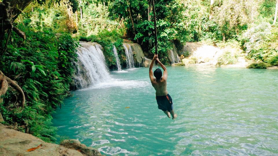 WING. Cambugahay Falls will douse the heat whenever you jump of one of its cliffs or swing into the water. Photo by Josh Berida 