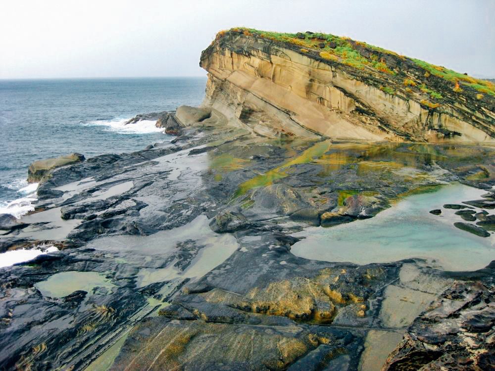RAW AND BEAUTIFUL. Biri's rock formations have a rugged and raw yet charming appeal. Photo by Doi Domasian (www.TheTravellingFeet.com)
 