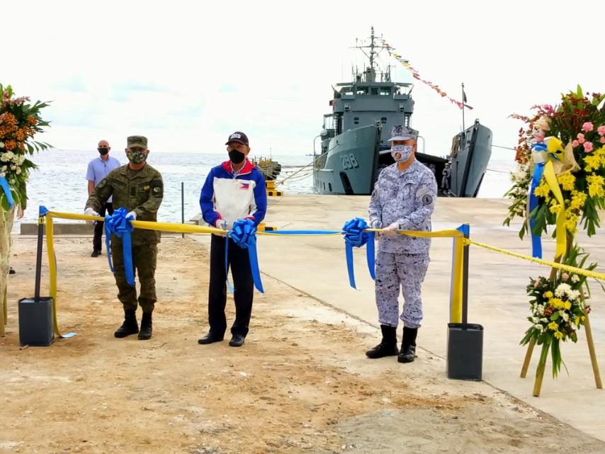 DEFENSE OFFICIALS. Defense Secretary Delfin Lorenzana (C), AFP chief General Felimon Santos Jr (L) and Navy chief Vice Admiral Giovanni Carlo Bacordo (R) inaugurate the new beaching ramp at Pag-asa Island on June 9, 2020. Photo courtesy of the Department of National Defense 