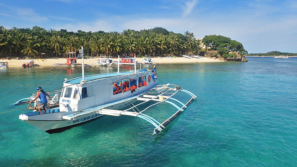 TO THE BEACH! A 15-minute boat ride from mainland Aklan brings you to Boracay. 