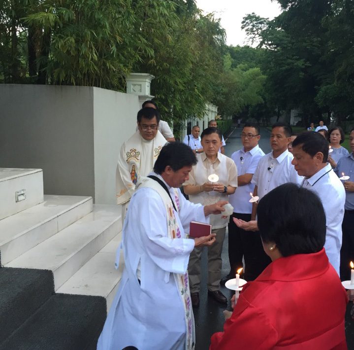 BLESS THIS HOUSE. President Rodrigo Duterte is joined by some staff members at his house blessing. Photo from Special Assistant to the President Bong Go  
