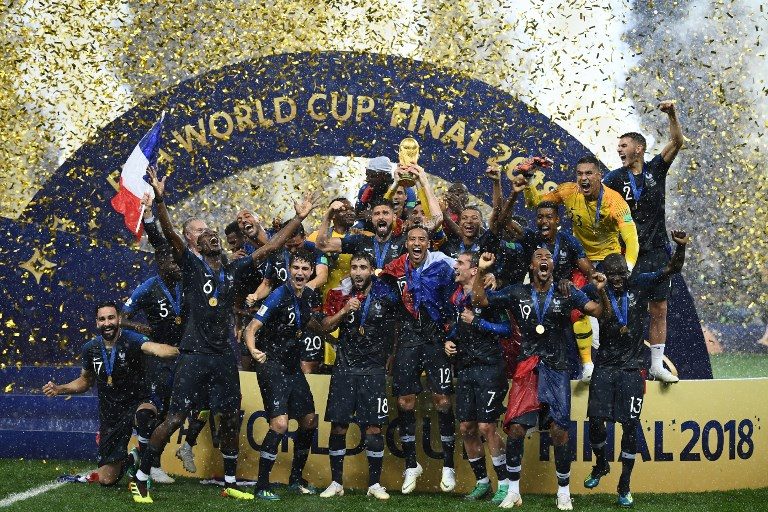 TWO AFTER 2 DECADES. France's players hold the World Cup trophy as they celebrate their win during the final ceremony. Photo by Franck Fife/AFP   