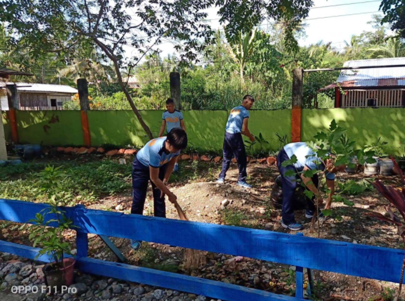 BUTUAN CITY. Policemen participate in Brigada Eskwela at the Babag Elementary School. Photo from Training Service Regional Special Training Unit 13's Twitter page  