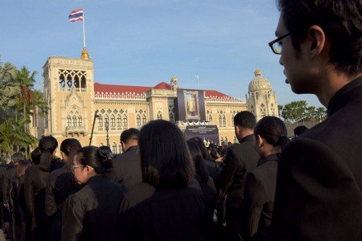 Thai junta ramps up its royalism with mass loyalty ceremony