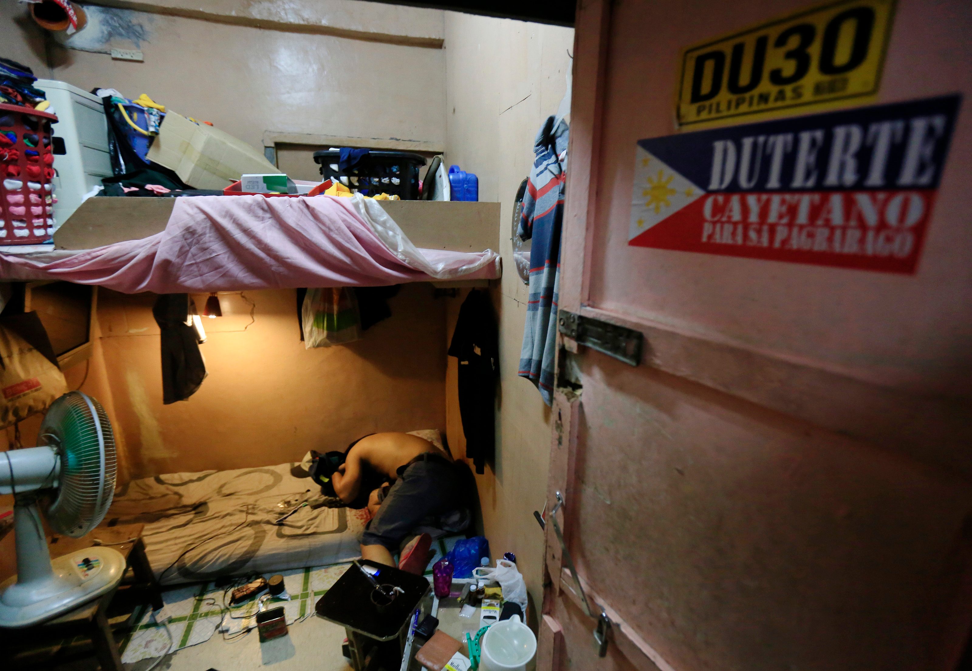 WAR ON DRUGS. A picture made available on 09 August 2016 shows a dead body following a police operation against illegal drugs inside a room in Manila. EUGENIO LORETO/EPA 