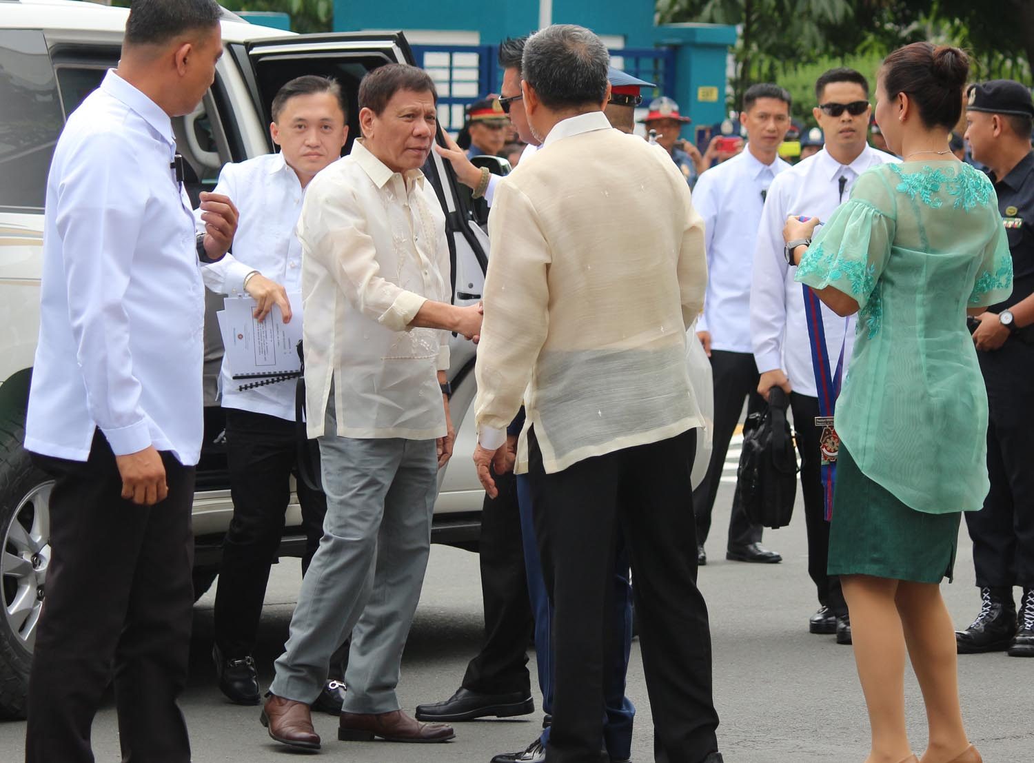 CLOSE-IN. Special Assistant to the President Secretary Bong Go steps out of the car right behind his longtime boss President Duterte in Camp Crame on July 1. Photo by Joel Liporada/Rappler 