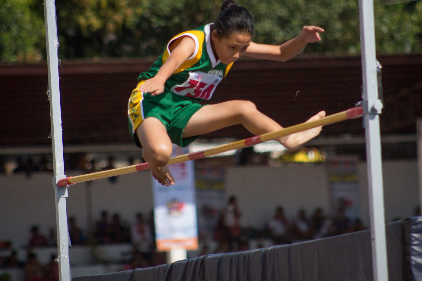 AIM BIG, LEAP HIGH. An Eastern Visayas athlete takes an extra effort to escalate the challenge of the high jump athletic event at the Binarayan Sports Complex 