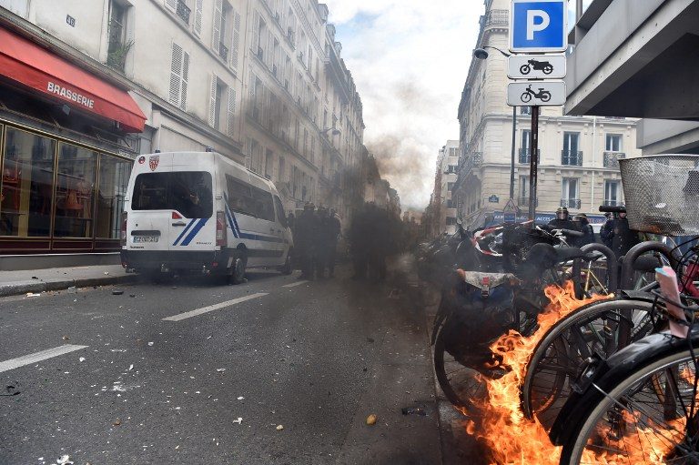 French president threatens ban on demos after Paris violence