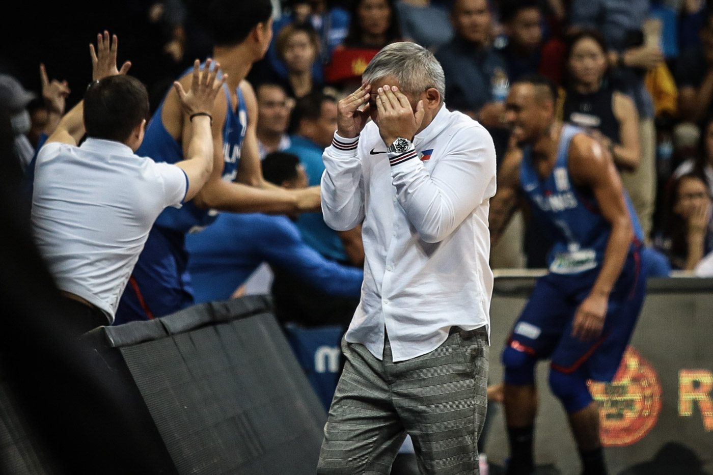 RELIEF. Chot Reyes and Gilas avoid an upset in front of their home crowd. Photo by Josh Albelda/Rappler 