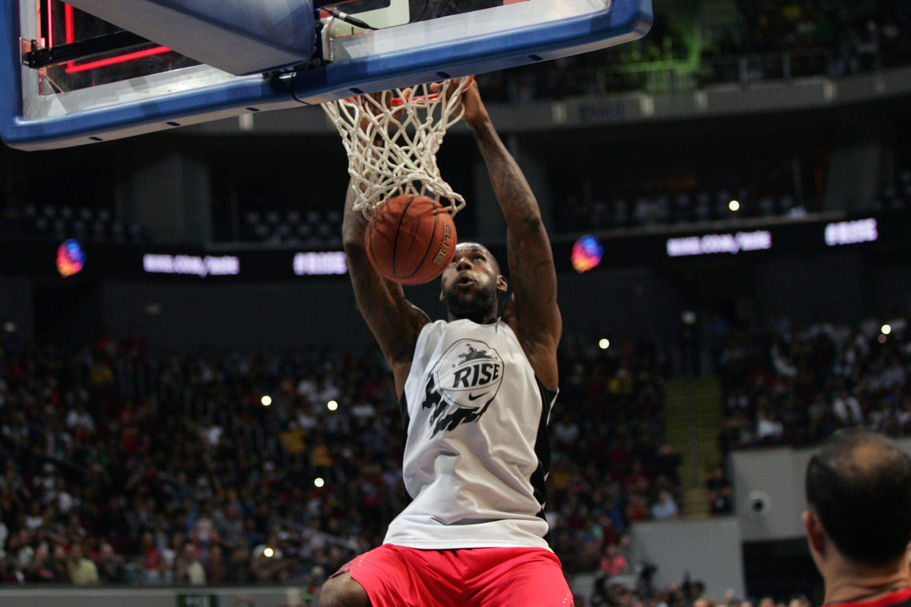 SLAM. And LeBron throws it down low with authority before an ecstatic crowd. Photo by Josh Albelda/Rappler 