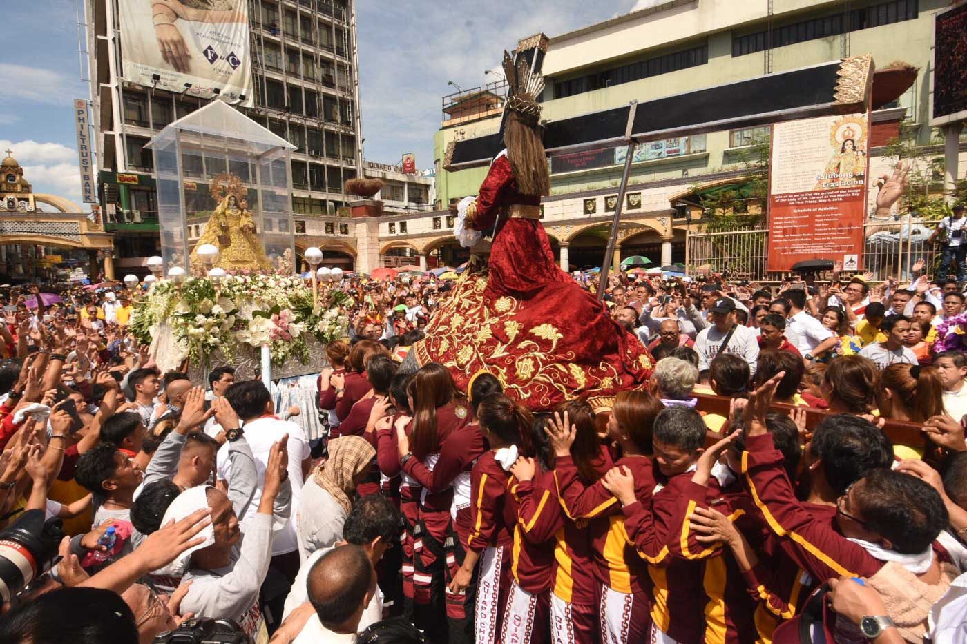 MOTHER AND SON. The image of Our Lady of Mount Carmel 'meets' the image of the Black Nazarene in front of Quiapo Church on May 4, 2018. Photo by Angie de Silva/Rappler 