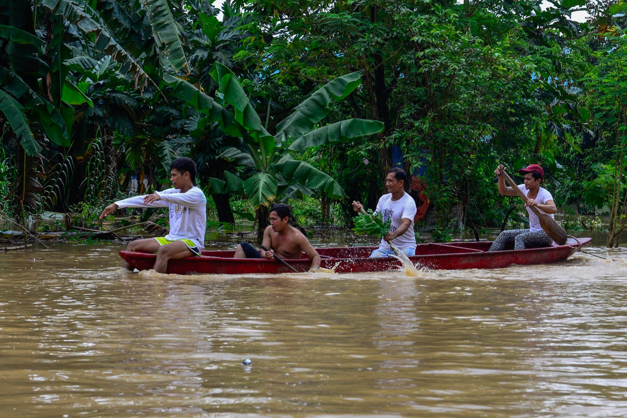 WATERWORLD. Nonstop rains flooded most of the villages in Greenland Bagong Silangan, Quezon City on June 20, 2018, forcing residents to flee to the safety in nearby evacuation centers. Photo by Maria Tan/Rappler   