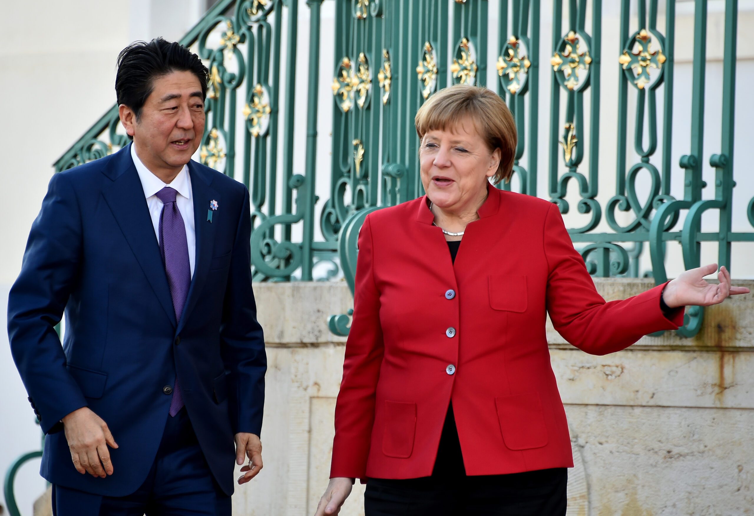 Merkel, Abe differ on how to fix world economy
