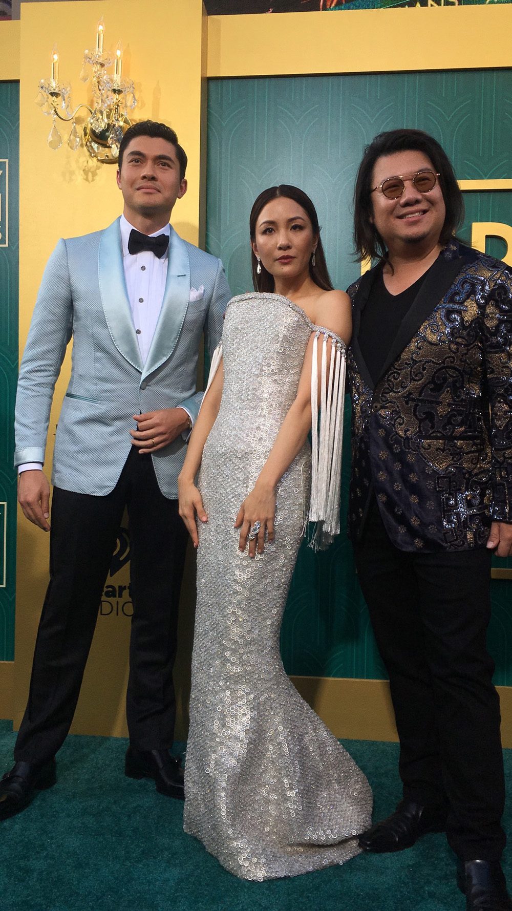 WITH THE AUTHOR. Henry Golding and Constance Wu pose with Kevin Kwan.  