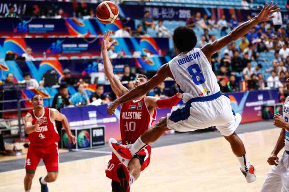 Calvin Abueva absorbed a horrible fall flat on his back after this foul was committed. Photo from FIBA 