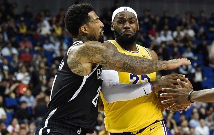 Nets beat Lakers to bring merciful end to tense China tour