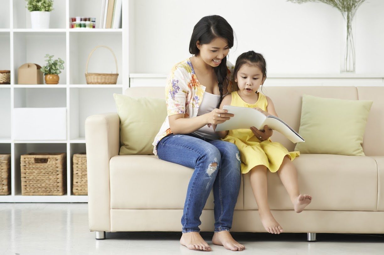 READING TOGETHER. Teach your child to love reading by turning it into a bonding activity  