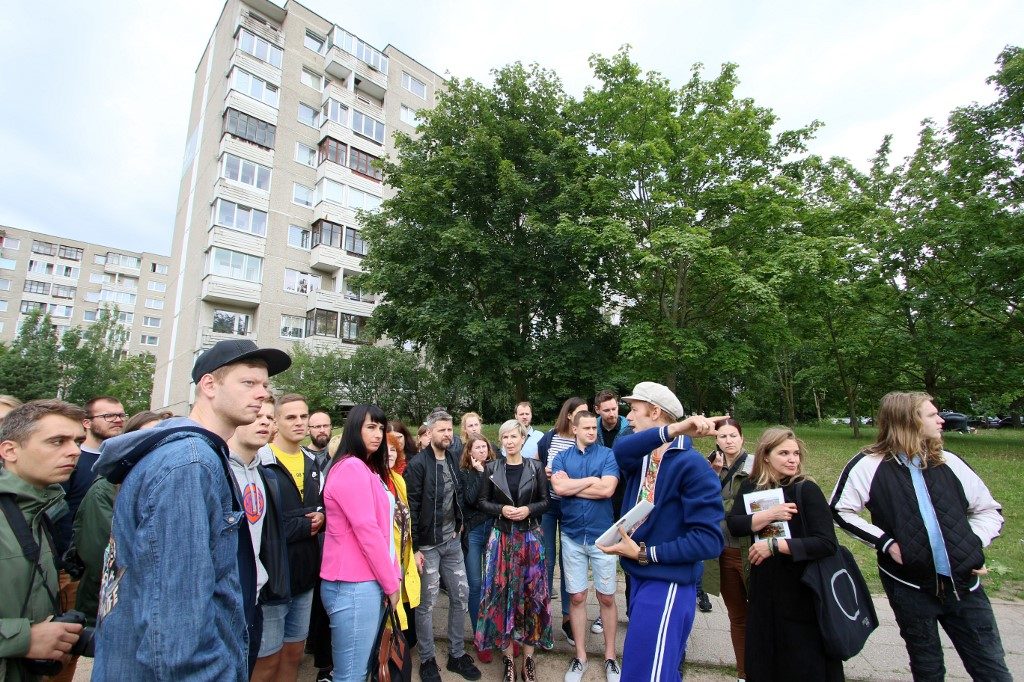 TOUR. People take part in a guided tour to the places where the HBO series 'Chernobyl was shot in the district Fabijoniskes in Vilnius, on July 13, 2019. Photo by Petras Malukas / AFP 
