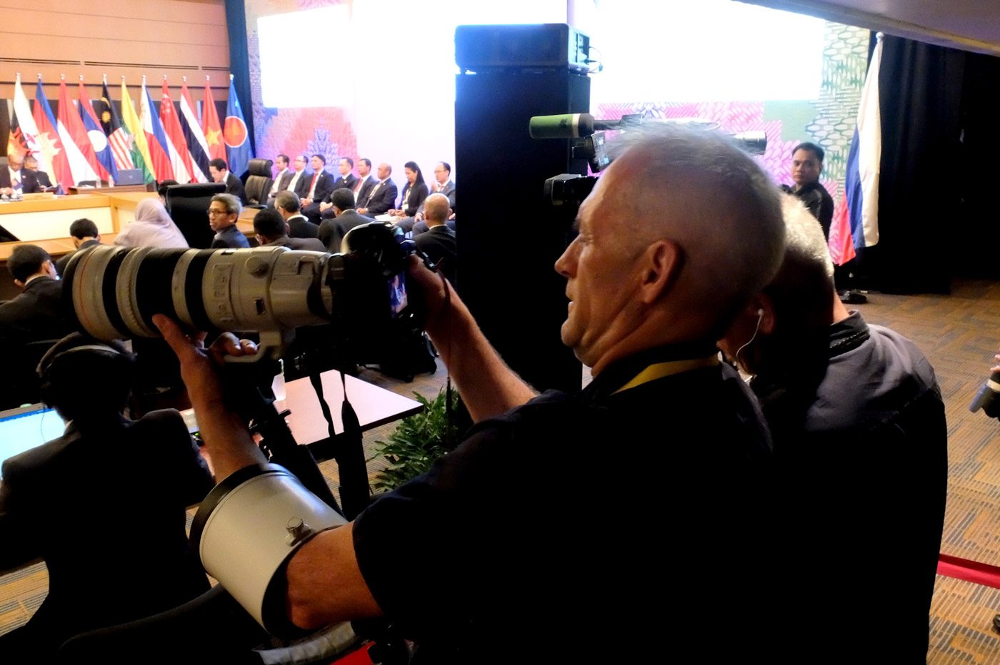 QUIET OBSERVERS. Photographers have to keep a safe distance from their subjects during ASEAN meetings in PICC. Photo by Angie de Silva/Rappler  