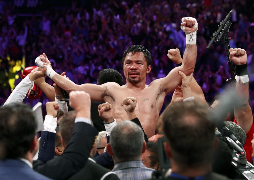 Pacquiao romps as oldest welterweight champ in history