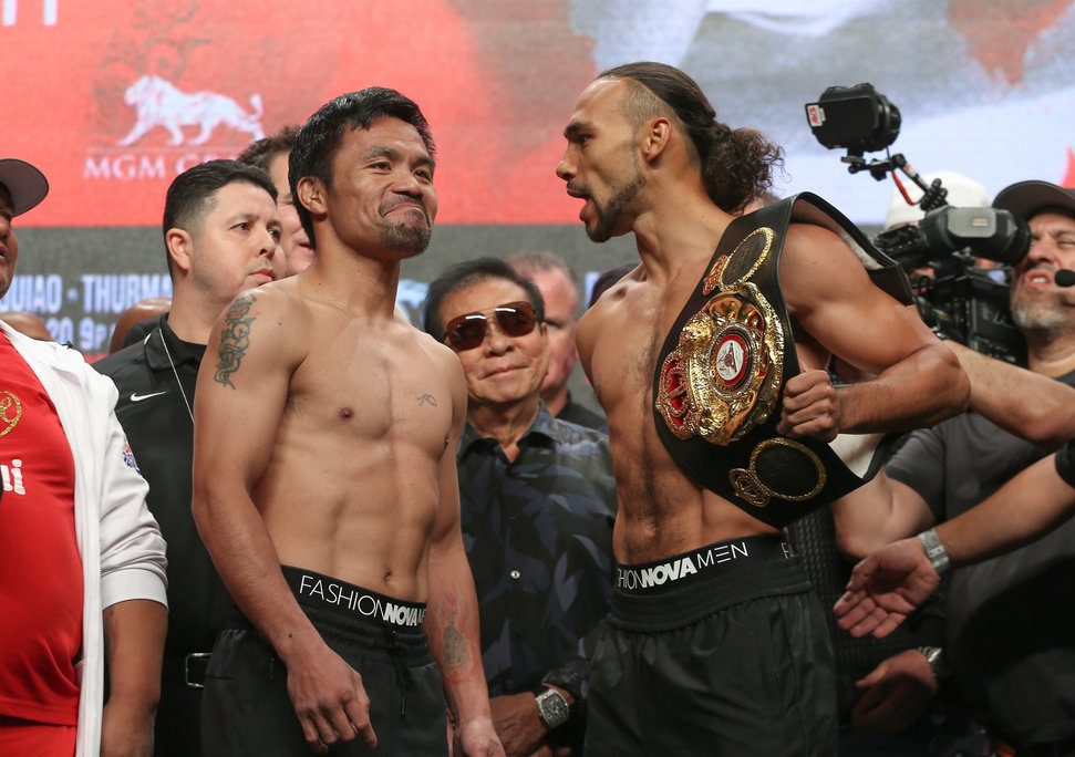 Pacquiao, Thurman face off at weigh-in