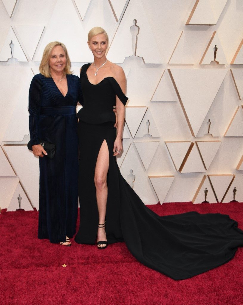 US-South African actress Charlize Theron and her mom Gerda Jacoba Aletta Maritz arrive for the 92nd Oscars at the Dolby Theatre in Hollywood, California on February 9, 2020. Photo by Robyn Beck / AFP 