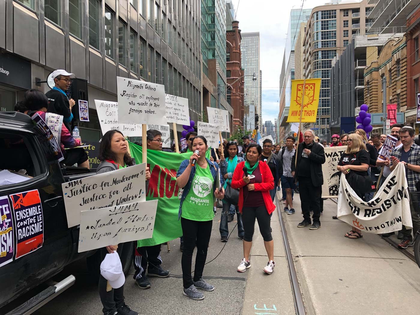 Filipino migrant farm workers, care workers join marches in cities across Canada