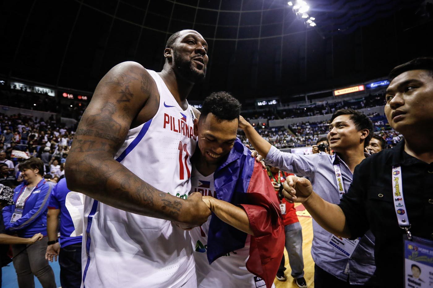 BROTHERS. Andray Blatche and Jayson Castro hug each other. Photo by Josh Albelda/Rappler 