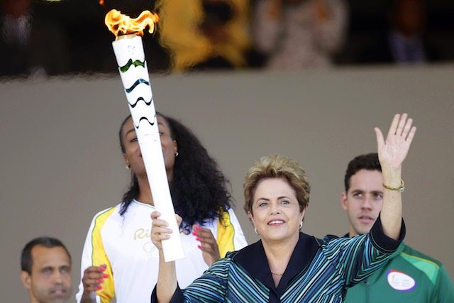 Rousseff vows crisis won’t mar Rio Games as flame relay begins